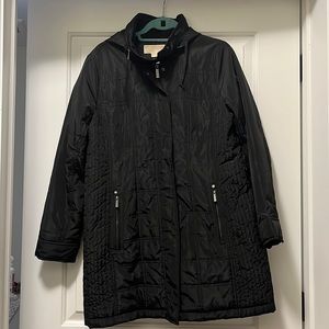 Womens Michael by Michael Kors jacket with hood. Size large.